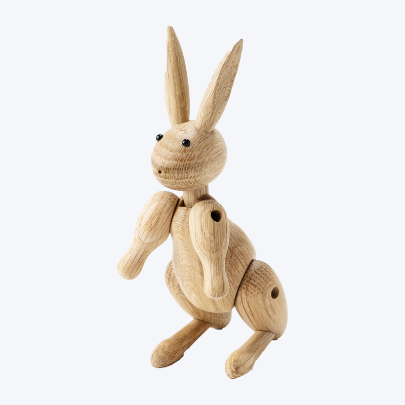 Kreatives Design bastelt Hasenornamente aus Holz